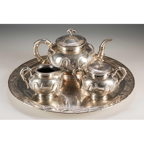 159 - A Chinese silver four piece tea set by Zeewo, early 20th century, each piece embossed with writhing ... 