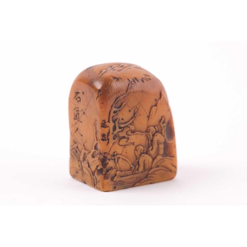 162 - A Chinese well carved Shoshan stone seal, of rectangular form with rounded top, carved in relief wit... 