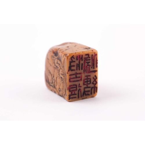 162 - A Chinese well carved Shoshan stone seal, of rectangular form with rounded top, carved in relief wit... 