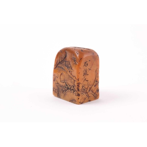 162 - A Chinese well carved Shoshan stone seal, of rectangular form with rounded top, carved in relief wit... 