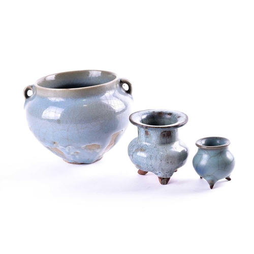 165 - Two Chinese jun ware censers and a two earred jar, Yuan/Ming or later, the small censer with a purpl... 