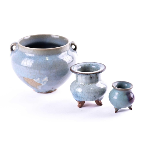 165 - Two Chinese jun ware censers and a two earred jar, Yuan/Ming or later, the small censer with a purpl... 