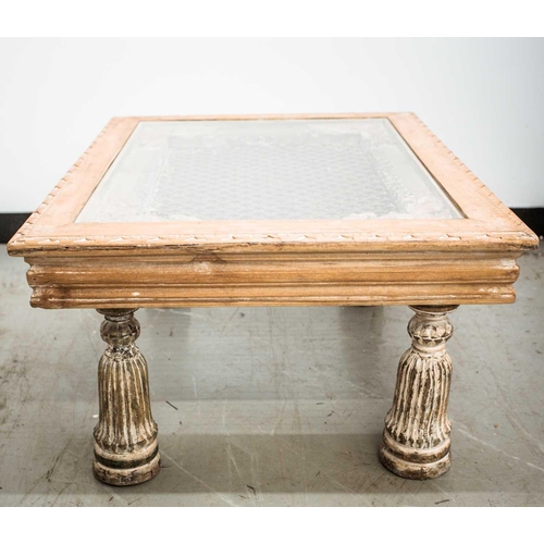 168 - An Indian hardwood coffee table, 20th century, constructed from a window with metal grill and set in... 