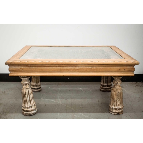 168 - An Indian hardwood coffee table, 20th century, constructed from a window with metal grill and set in... 