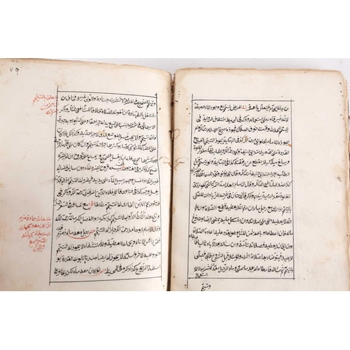 170 - A probably late 19th century Holy Quran with leather-bound spine and sign of marbled boards the laid... 