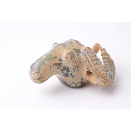 178 - An Indian pale green and cream jade carving of the head of an Indian water buffalo .9 cm wide by 9 c... 