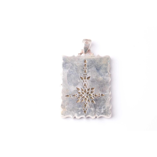 180 - A Persian white metal mounted rectangular red hardstone rectangular cartouch pendant, intaglio cut w... 