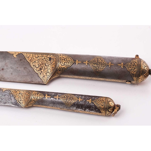 182 - A Persian Kard and scabbard, Qajar, 19th century, with wootz blade and gold koftari and calligraphic... 