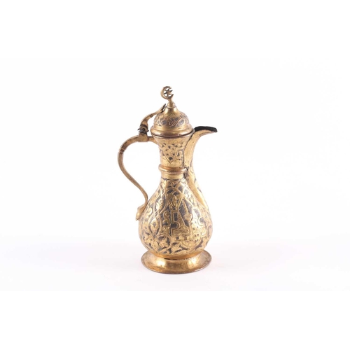 192 - An Ottoman-style baluster form gilt brass coffee pot, with star and crescent finial to the hinged do... 