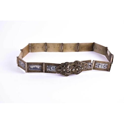 193 - A 19th Armenian /Ottoman Turkish white metal ladies belt with inset niello decorated panels and a fi... 