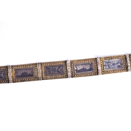 193 - A 19th Armenian /Ottoman Turkish white metal ladies belt with inset niello decorated panels and a fi... 