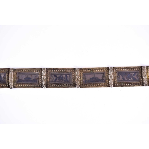 193 - A 19th Armenian /Ottoman Turkish white metal ladies belt with inset niello decorated panels and a fi... 