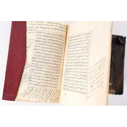 198 - A probably early 20th century Holy Quran with handwritten black and red Islamic script within gilt b... 