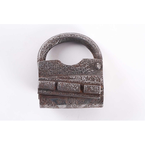 229 - A Persian heavy steel padlock, Qajar Dynasty. Profusely engraved with Arabic text and islimi decorat... 