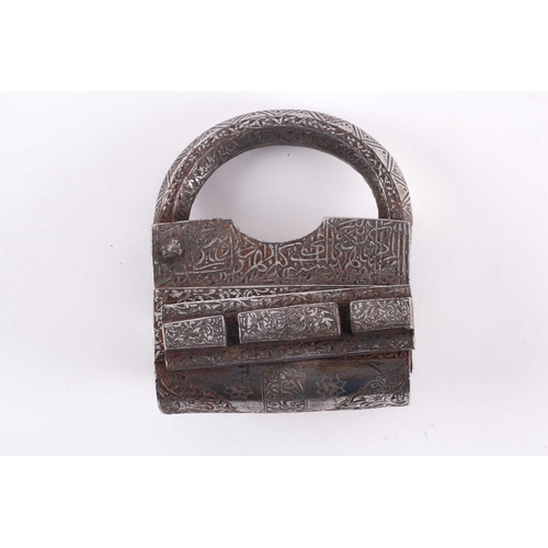 229 - A Persian heavy steel padlock, Qajar Dynasty. Profusely engraved with Arabic text and islimi decorat... 