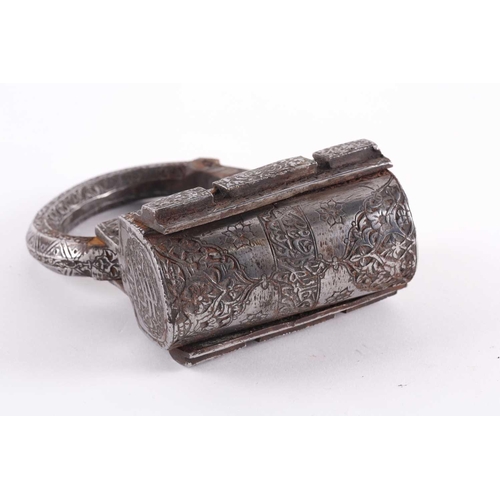 229 - A Persian heavy steel padlock, Qajar Dynasty. Profusely engraved with Arabic text and islimi decorat... 