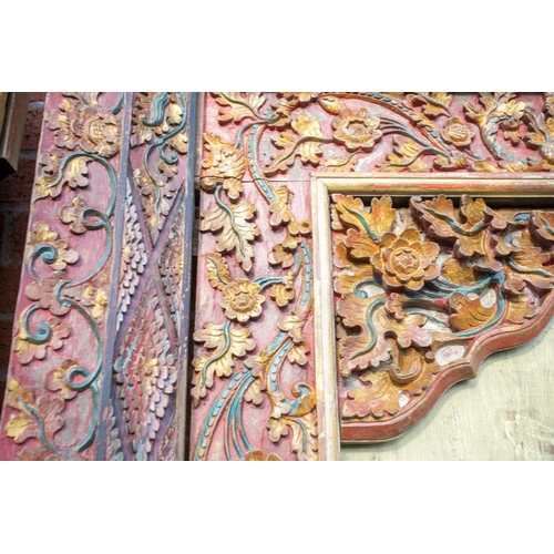 230 - A pair of Islamic style doors, 20th century, carved and painted with flowers and criss cross lines, ... 