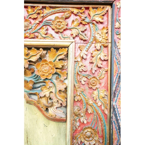 230 - A pair of Islamic style doors, 20th century, carved and painted with flowers and criss cross lines, ... 