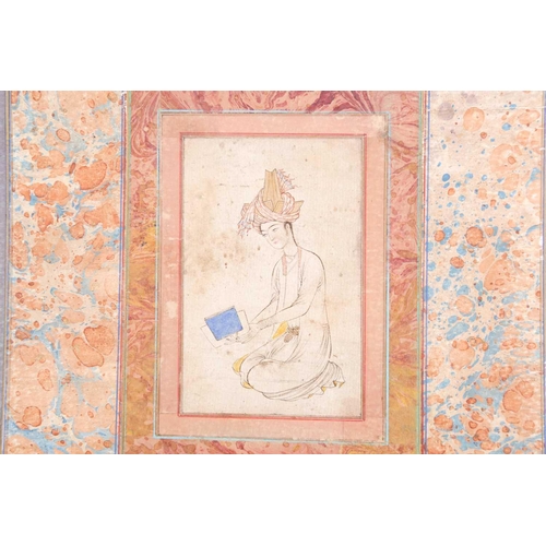 231 - A Mughal school watercolour study of a young gentleman in an elaborate turban reading a book, 19th c... 