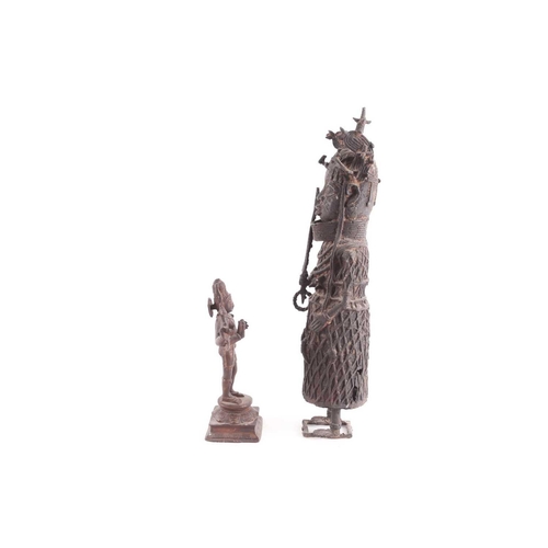 234 - An Indian bronze standing figure of Vishnu, 19th century, standing on a square platform; and a large... 