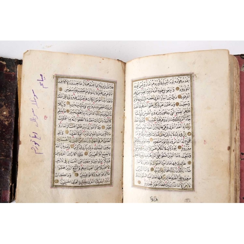 238 - A probably 19th century Holy Quran handwritten on laid paper with black and red Islamic script also ... 