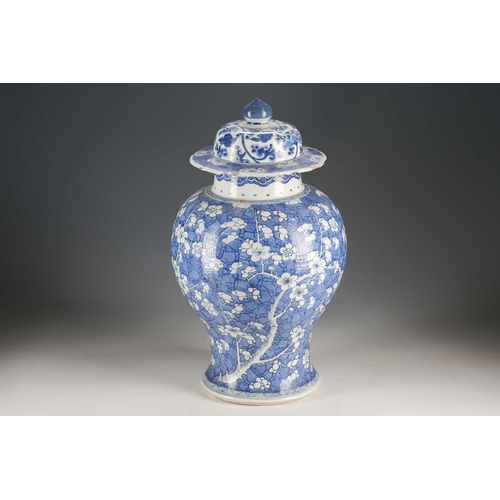 239 - A Chinese blue & white vase and cover, Qing, Kangxi, the cover with pointed knop and painted with lo... 