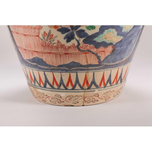 258 - A large Japanese imari vase and cover, Edo period, 17th/18th century, painted with panels of chrysan... 