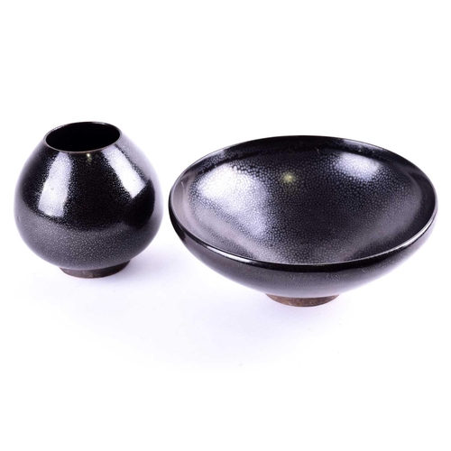 263 - A Chinese Jian ware 'Oil spot' bowl and vase, each with a thick black glaze suffused with variegated... 