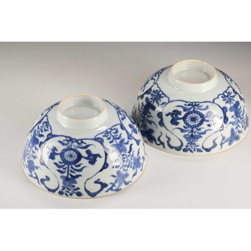 271 - A pair of Chinese blue & white deep sided bowls, Qing, 18th century, painted with floral scrolls and... 