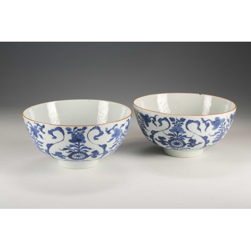 271 - A pair of Chinese blue & white deep sided bowls, Qing, 18th century, painted with floral scrolls and... 