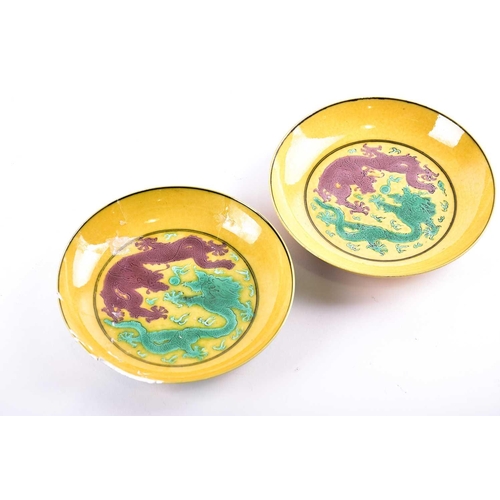 272 - A pair of Chinese porcelain dragon saucer dishes, six character Guangxu mark and possibly of the per... 