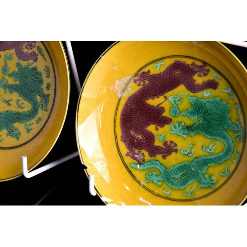 272 - A pair of Chinese porcelain dragon saucer dishes, six character Guangxu mark and possibly of the per... 