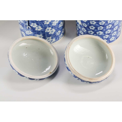 277 - A near pair of Chinese blue & white containers and covers, Qing, Kangxi period, with simulated bambo... 