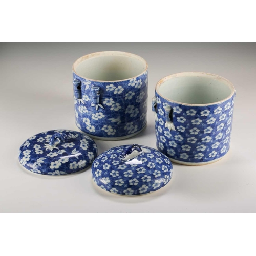 277 - A near pair of Chinese blue & white containers and covers, Qing, Kangxi period, with simulated bambo... 