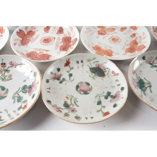 281 - A quantity of Chinese famille rose saucers, early 20th century, painted to the centre with a peach, ... 