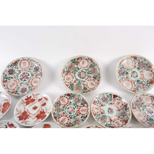 281 - A quantity of Chinese famille rose saucers, early 20th century, painted to the centre with a peach, ... 