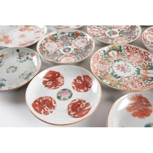 281 - A quantity of Chinese famille rose saucers, early 20th century, painted to the centre with a peach, ... 