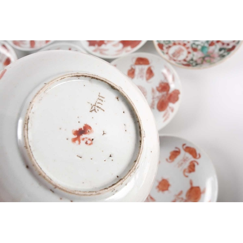 281 - A quantity of Chinese famille rose saucers, early 20th century, painted to the centre with a peach, ... 