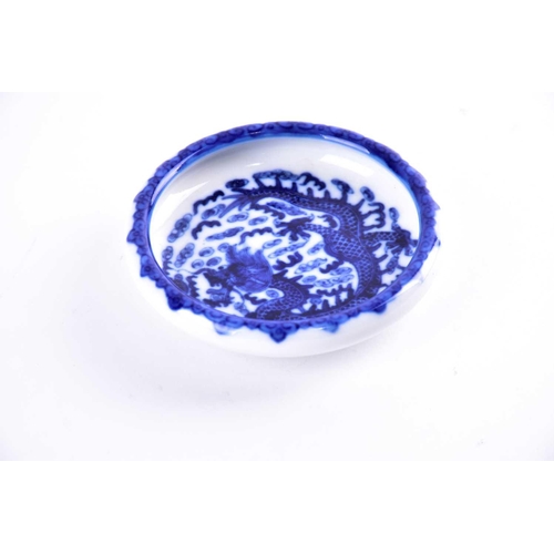 286 - A Chinese blue & white porcelain brush washer, late Qing/20th century, painted with a writhing drago... 