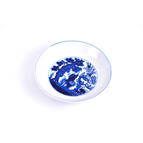 287 - A Chinese blue & white deep saucer dish, six character mark for Guangxu and possibly of the period, ... 