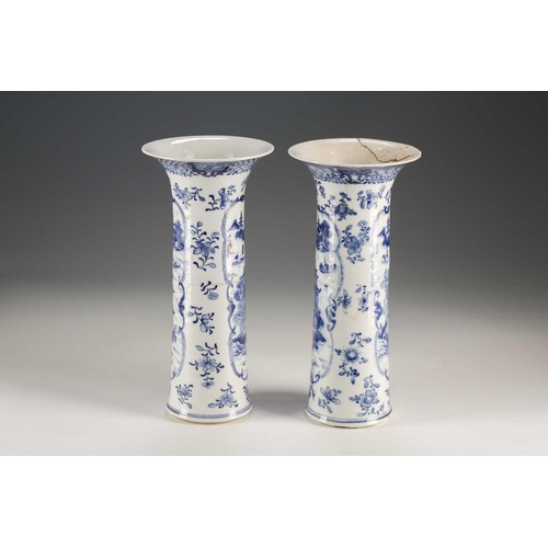 290 - A pair of Chinese blue & white vases, Qing, 18th century, the cylindrical bodies with flaring rims, ... 