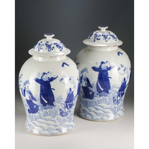 301 - A pair of Chinese blue and white vases and covers, Qing, late 19th century, painted with the eight T... 