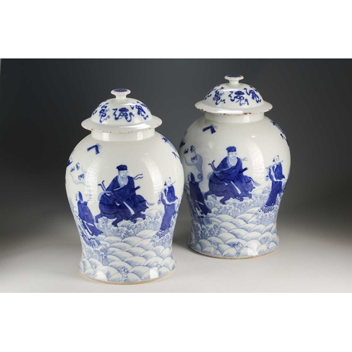 301 - A pair of Chinese blue and white vases and covers, Qing, late 19th century, painted with the eight T... 