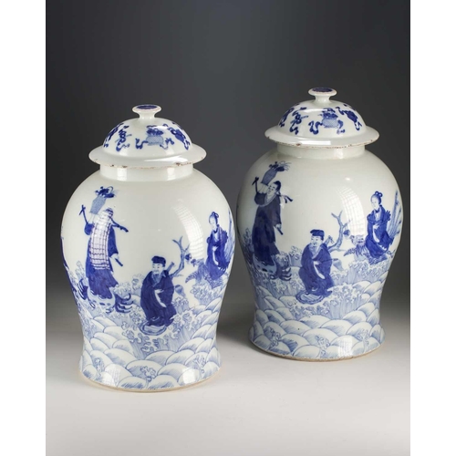 301 - A pair of Chinese blue and white vases and covers, Qing, late 19th century, painted with the eight T... 