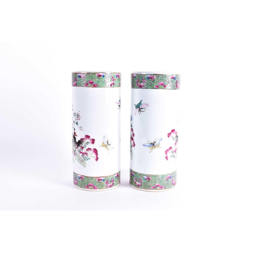 303 - A pair of Chinese famille rose sleeve vases, Republic period, 20th century, painted with cockerels a... 