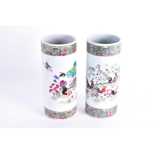 303 - A pair of Chinese famille rose sleeve vases, Republic period, 20th century, painted with cockerels a... 