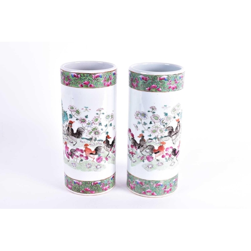 303 - A pair of Chinese famille rose sleeve vases, Republic period, 20th century, painted with cockerels a... 