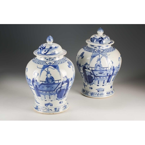 306 - A pair of Chinese blue and white vases and covers, Qing, late 19th century, the covers painted with ... 