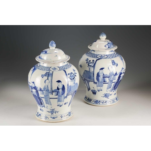 306 - A pair of Chinese blue and white vases and covers, Qing, late 19th century, the covers painted with ... 