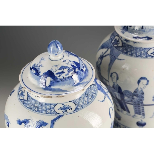 306 - A pair of Chinese blue and white vases and covers, Qing, late 19th century, the covers painted with ... 